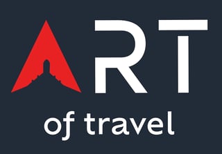 ART of travel logo with red triangle arrow and white letters on dark background